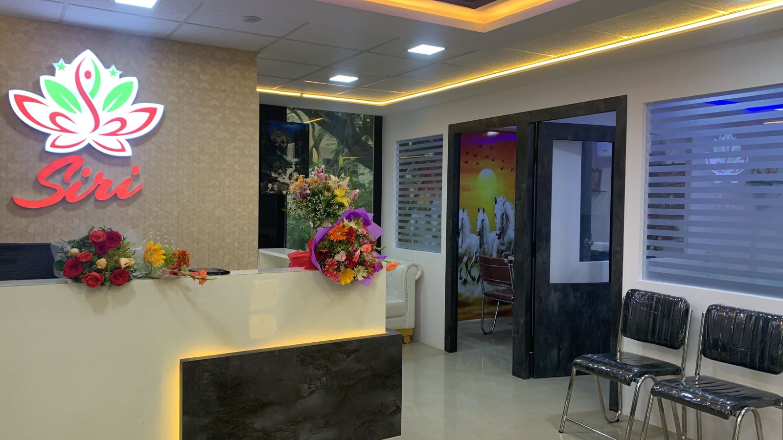 Siri Beauty Salon reception area with elegant counter and logo display